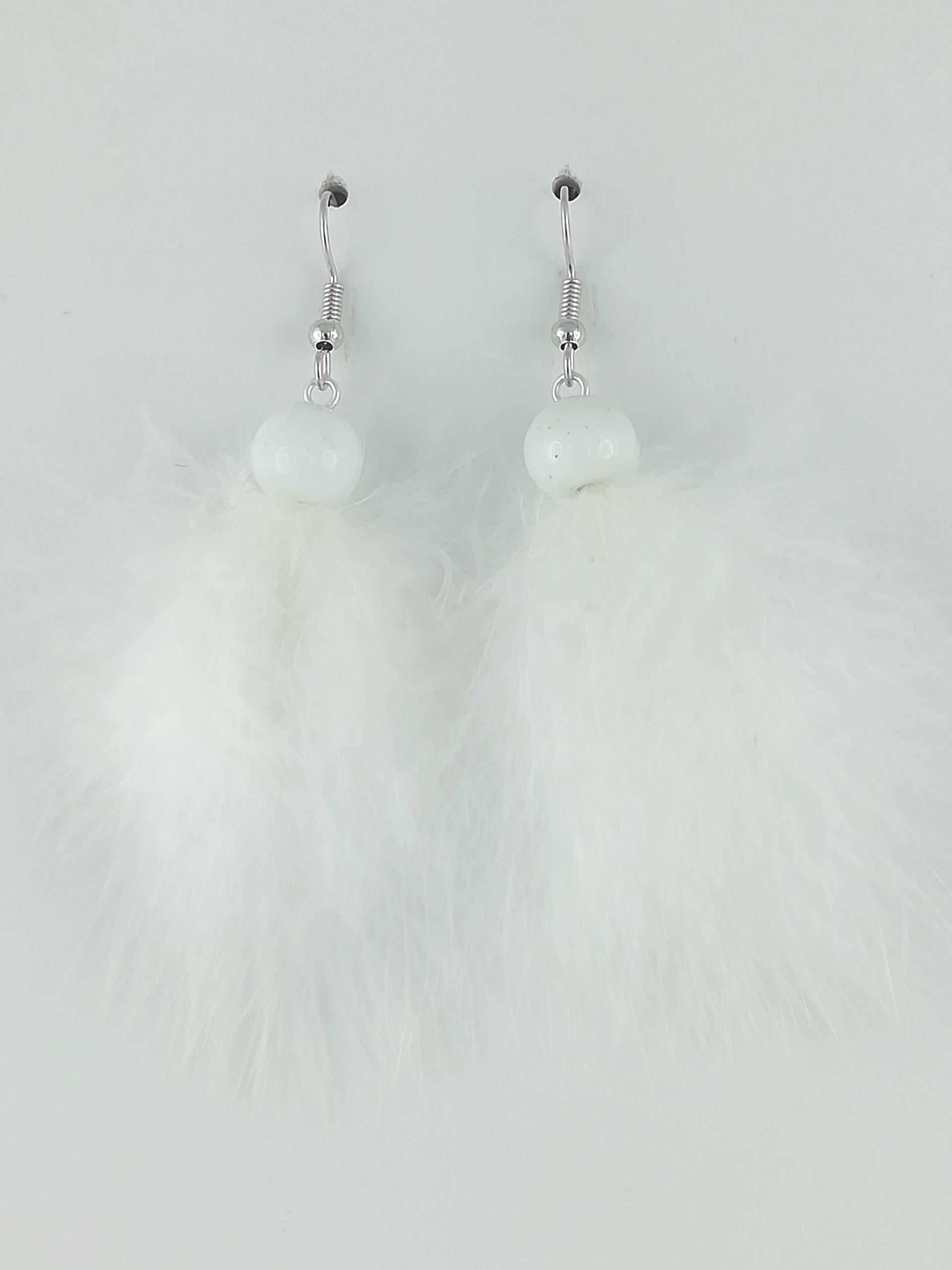 Boucles d'oreilles en duvet de paon blanc