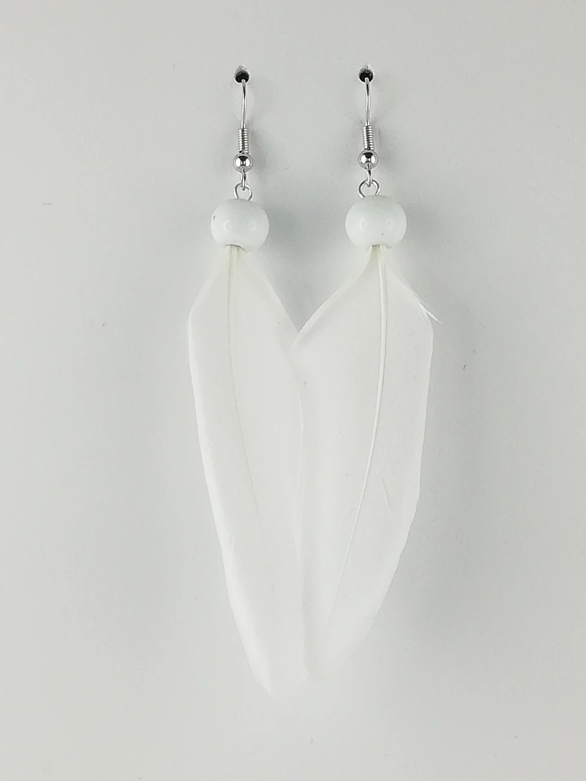 Boucles d'oreilles en plumes blanches de tourterelle