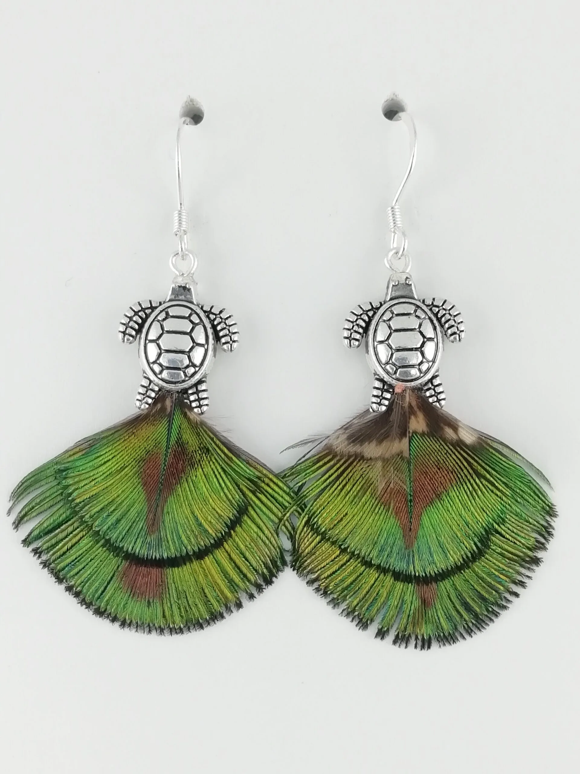 Boucles d’oreilles en plumes écailles de paon